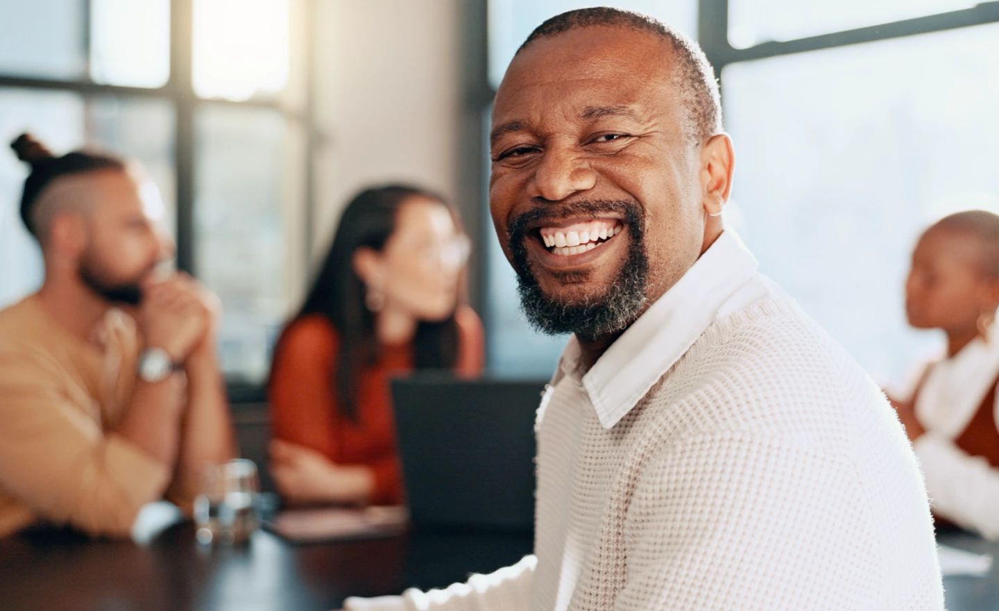 welcome to the table with smiling man